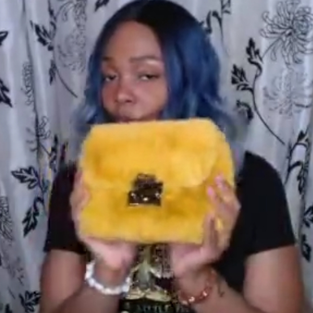 Fuzzy lil handbag Gold New!
